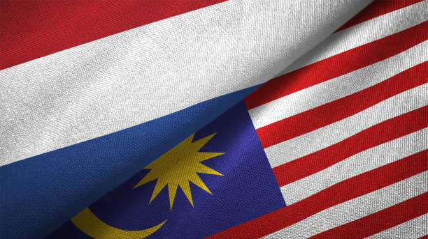 istock Malaysia and Netherlands two flags together textile cloth fabric texture 1093317626