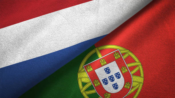 portugal et les pays-bas deux drapeaux ensemble textile tissu tissu texture - portuguese culture portugal flag coat of arms photos et images de collection