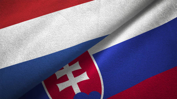 istock Slovakia and Netherlands two flags together textile cloth fabric texture 1093317832