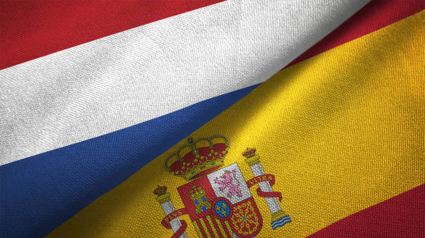 istock Spain and Netherlands two flags together textile cloth fabric texture 1093317938