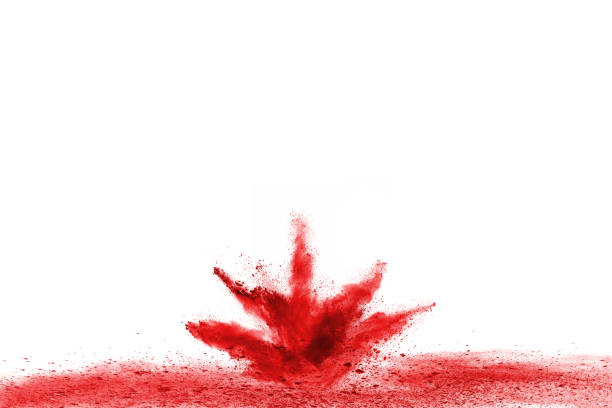 istock Freeze motion of red powder exploding, isolated on white background. Abstract design of red dust cloud. Particles explosion screen saver, wallpaper 1093319832