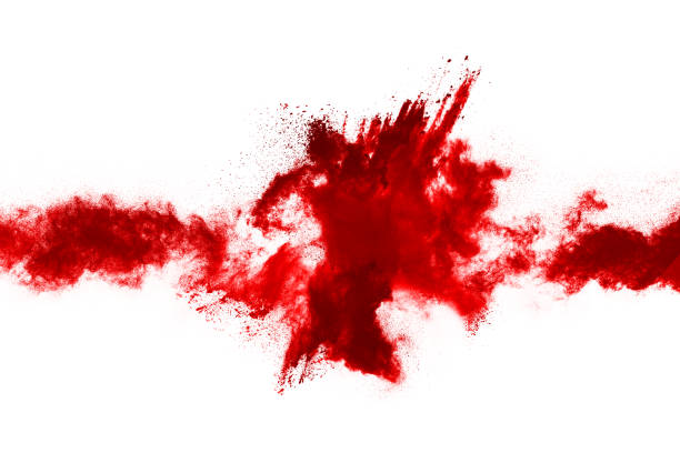 istock Freeze motion of red powder exploding, isolated on white background. Abstract design of red dust cloud. Particles explosion screen saver, wallpaper 1093319882