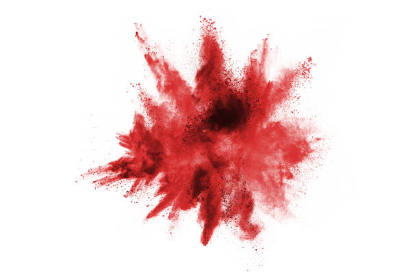 istock Freeze motion of red powder exploding, isolated on white background. Abstract design of red dust cloud. Particles explosion screen saver, wallpaper 1093319932