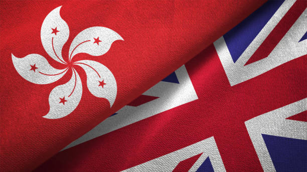 United Kingdom and Hong Kong two flags together textile cloth fabric texture United Kingdom and Hong Kong flag together realtions textile cloth fabric texture government large currency finance stock pictures, royalty-free photos & images