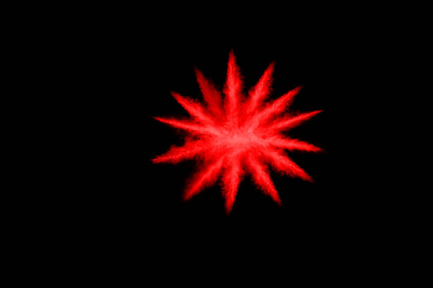 istock abstract red powder explosion on black background.abstract red powder splatted on black background. Freeze motion of red powder exploding. 1093320110