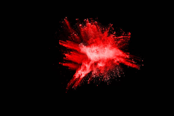 istock abstract red powder explosion on black background.abstract red powder splatted on black background. Freeze motion of red powder exploding. 1093320120