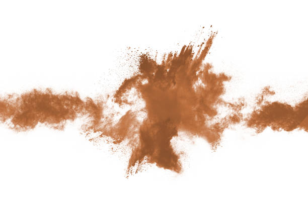 istock Brown color powder explosion on white background. Colored cloud. Colorful dust explode. Paint Holi. 1093320242