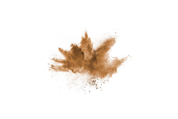 istock Brown color powder explosion on white background. Colored cloud. Colorful dust explode. Paint Holi. 1093320252