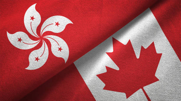 istock Canada and Hong Kong two flags together textile cloth fabric texture 1093320260