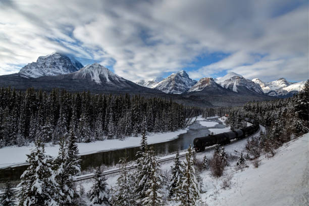 istock Morant's Curve with train in winter, Banff National Park, AB, Canada 1093320296