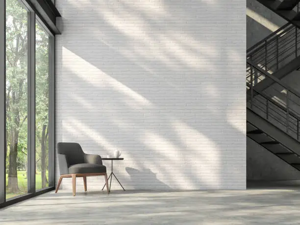 Loft style stair hall 3d render,There are white brick wall,polished concrete floor and black steel structure stair,There are large windows look out to see the nature,sunlight shining into the room.