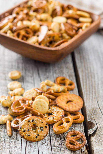 istock Mixed salty snack crackers and pretzels 1093329700
