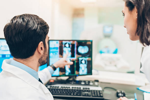 istock Two doctors discuss MRI scan results 1093329958