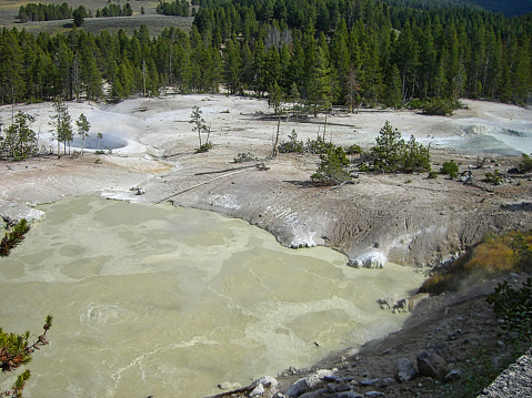 Opal Pool is a hot spring in the Midway Geyser Basin of Yellowstone National Park, Wyoming. Opal Pool usually has a temperature of approximately 132 °F.