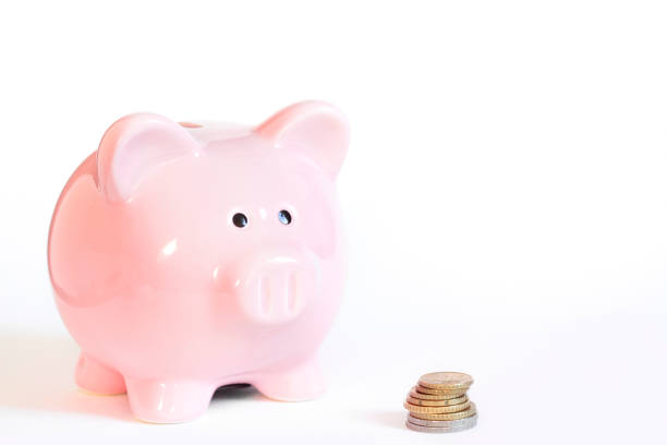 istock piggy bank and stack of coins 1093344434