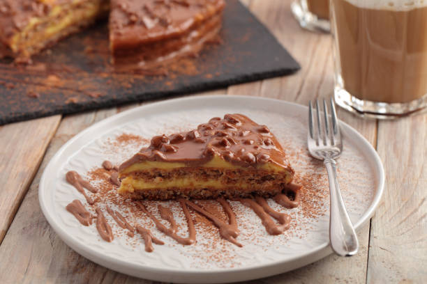 istock Swedish almond cake with dark chocolate and coffee latte 1093344588