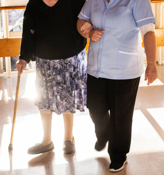 istock carer with old resident 1093346860