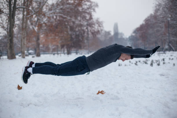 istock Young man exercising on winter day 1093349256