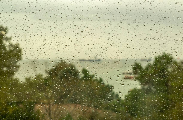 istock Water drops on wet car window 1093351250