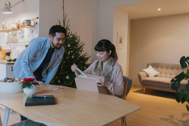 istock Japanese couple receives parcel during Christmas 1093353882