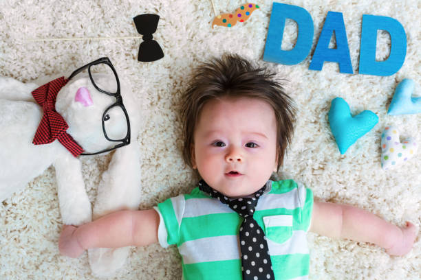 istock Baby boy celebrating Fathers Day with stuffed animals 1093363246