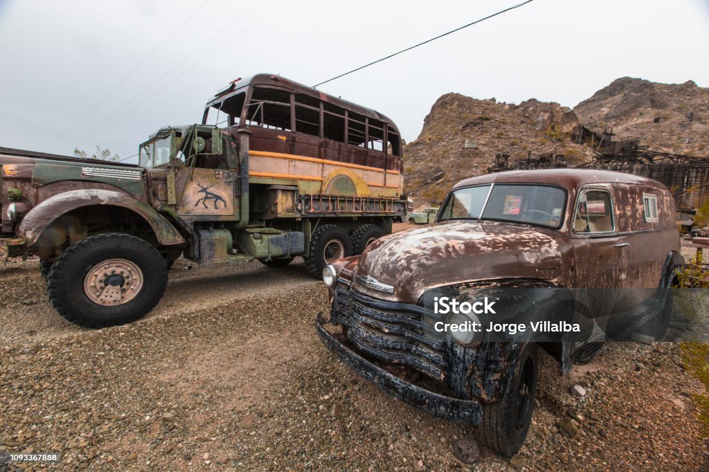 Old vintage vehicles at a ghost town Hot Rod Car Stock Photo
