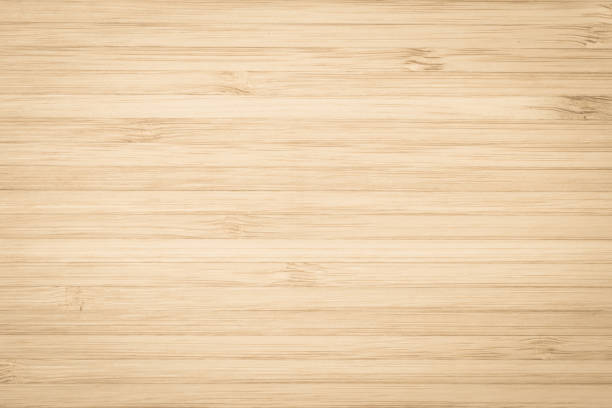 Wood texture background in natural light yellow cream color