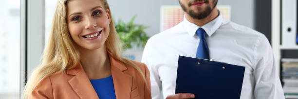 istock Group of modern businesspeople in office debate 1093375846
