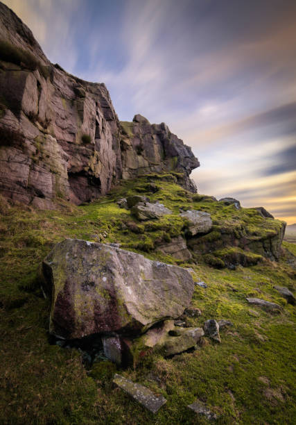 istock Rock face with streaks of cloud 1093377486