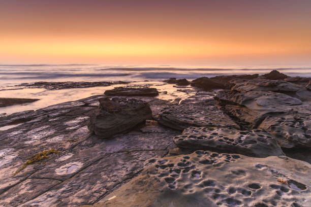 istock Sunrise Seascape and Rock Ledge 1093385294