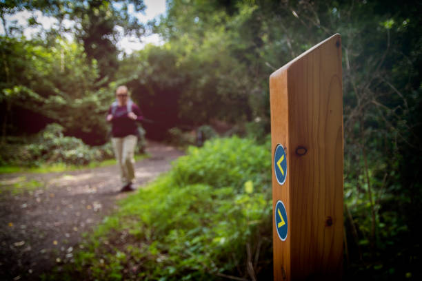 Woman walking the Scotland Fife Coastal Path
