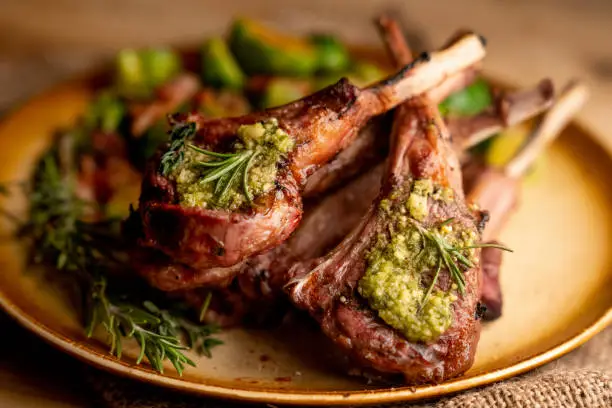 Photo of Grilled New Zealand Lamb Chops Plated With Sauteed Brussel Sprouts