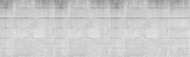 istock Panorama of Stone block wall background seamless and pattern 1093406390