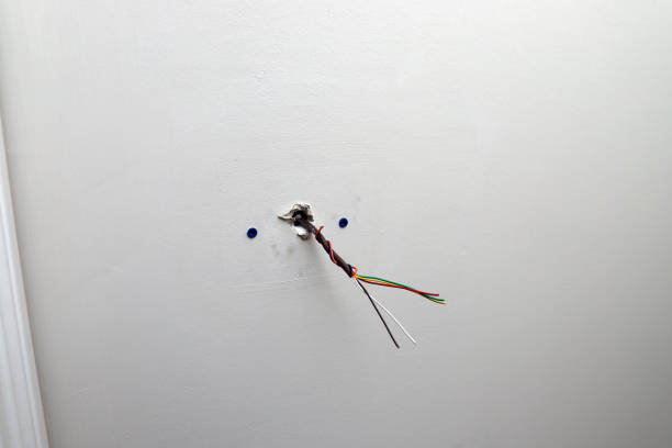 Control wire for thermsotat used with a HVAC unit, coming out of wall during installation