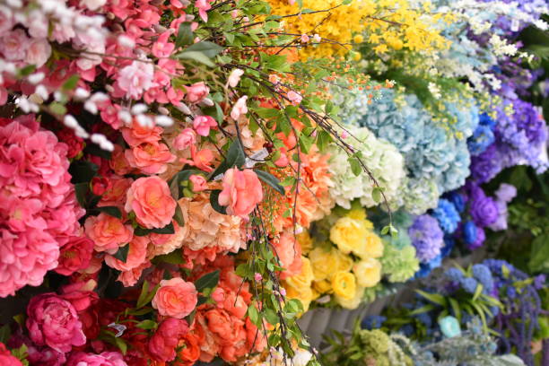 istock Synthetic Rainbow Colored Bouquets with Red in Foreground 1093425936