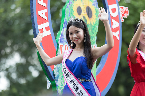 Washington, D.C., USA - July 4, 2018, The National Independence Day Parade, Taiwanese beauty queens on a float, going down constitution avenue during the parade