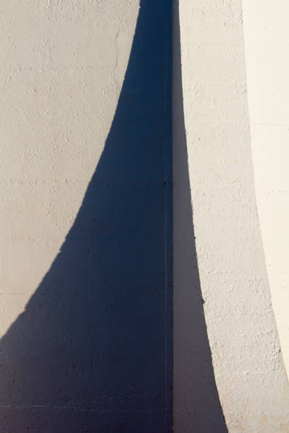istock Architectural details of external lighthouse wall in shadow. 1093436180