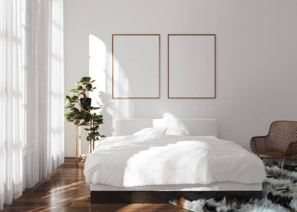 cornice poster mock-up in camera da letto moderna, stile scandinavo - contemporary bed luxury hotel room foto e immagini stock