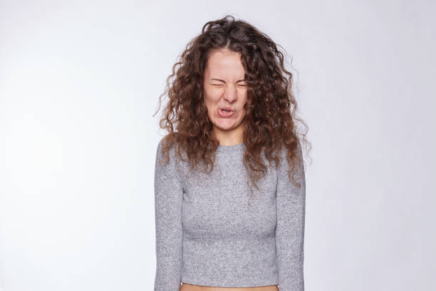 istock Curly haired funny woman express her attitude 1093438872