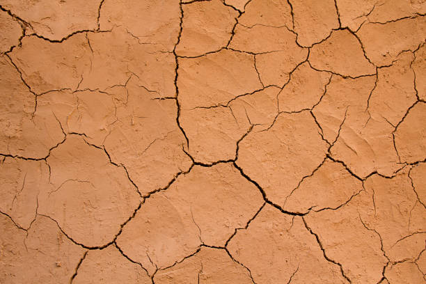 istock Abstract background of dried cracked earth 1093445482