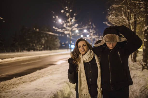 istock Love couple walking on a winter night 1093455468