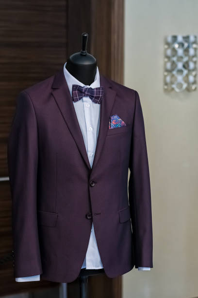 istock stylish men's suit maroon on a mannequin 1093456788