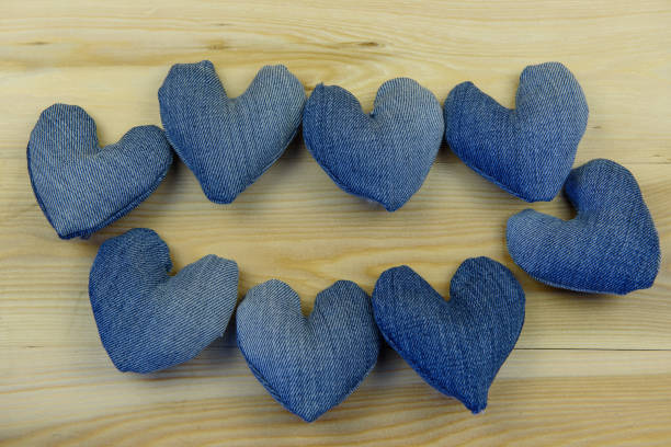 istock Denim heart lies on a village background. 1093459526