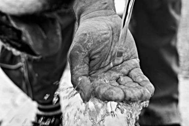 closeup of rough man hands splashing water/ Hygiene concept