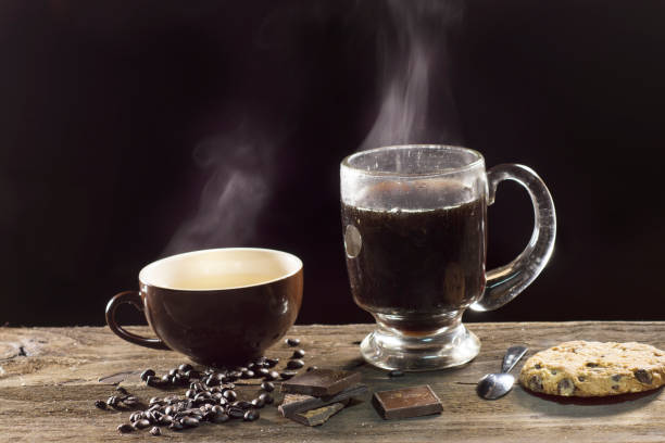 istock Two steaming cups of coffee 1093464836