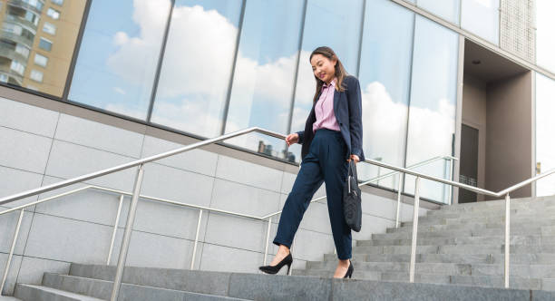 istock Young Asian Woman Going Home After Work 1093480260