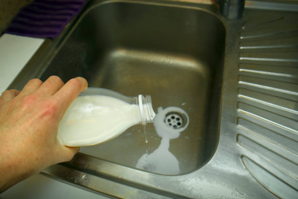 istock Spoiled bottle of milk 1093482058