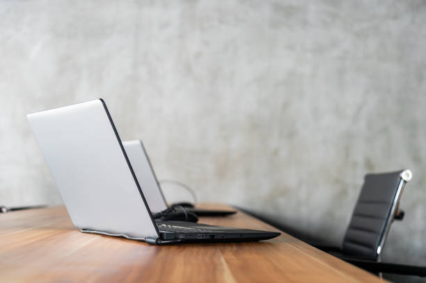 istock business concept .computer laptop on the office with soft-focus and over light in the background 1093485078