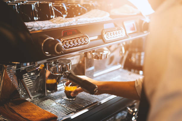 istock closeup coffee machine with soft-focus and over light in the background 1093485100