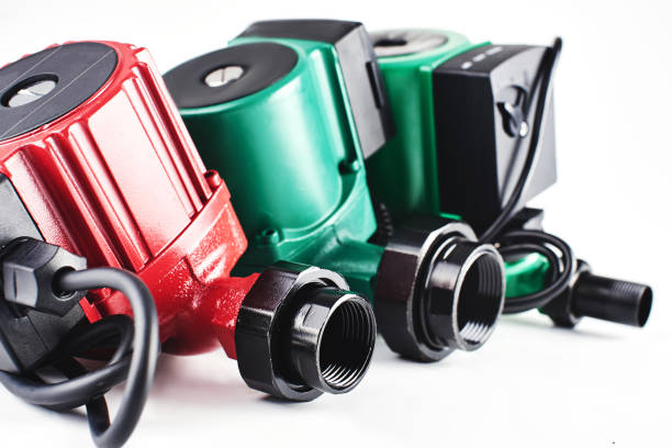 istock Red and green circulation pumps for heating on a white background. 1093490362